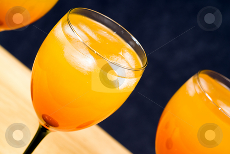 To use this stock image in your creative project, please select the size you need over to the right and click the "Add to Cart" button.
Your downloaded image will come with the Cutcaster watermark removed so don’t worry about the watermark you see on this page. Alcoholic Beverage Closeup stock photo, Closeup of some alcoholic beverages shot in wine glasses by Richard Nelson
