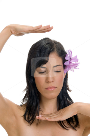 To use this stock image in your creative project, please select the size you need over to the right and click the "Add to Cart" button.
Your downloaded image will come with the Cutcaster watermark removed so don’t worry about the watermark you see on this page. Female with flower showing hand gesture stock photo, Female with flower showing hand gesture against white background by Imagery Majestic