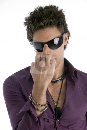 To use this stock image in your creative project, please select the size you need over to the right and click the "Add to Cart" button.
Your downloaded image will come with the Cutcaster watermark removed so don’t worry about the watermark you see on this page. Handsome model with sunglasses stock photo, Handsome model with sunglasses with white background by Imagery Majestic