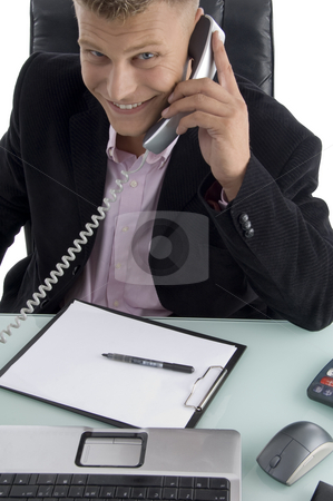 To use this stock image in your creative project, please select the size you need over to the right and click the "Add to Cart" button.
Your downloaded image will come with the Cutcaster watermark removed so don’t worry about the watermark you see on this page. Smiling lawyer talking on phone stock photo, Smiling lawyer talking on phone on an isolated background by Imagery Majestic