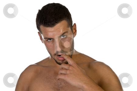 To use this stock image in your creative project, please select the size you need over to the right and click the "Add to Cart" button.
Your downloaded image will come with the Cutcaster watermark removed so don’t worry about the watermark you see on this page. Young male looking with finger in his mouth stock photo, Young male looking with finger in his mouth on an isolated background by Imagery Majestic