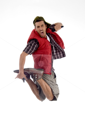 To use this stock image in your creative project, please select the size you need over to the right and click the "Add to Cart" button.
Your downloaded image will come with the Cutcaster watermark removed so don’t worry about the watermark you see on this page. Man jumping and singing in the air stock photo, Man jumping and singing in the air isolated on white background by Imagery Majestic