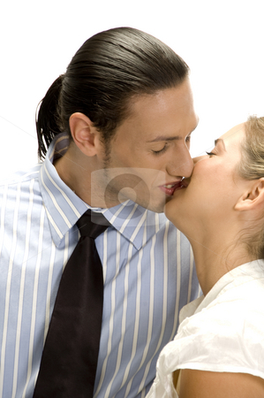 To use this stock image in your creative project, please select the size you need over to the right and click the "Add to Cart" button.
Your downloaded image will come with the Cutcaster watermark removed so don’t worry about the watermark you see on this page. Kissing couple posing stock photo, Kissing couple posing with white background by Imagery Majestic