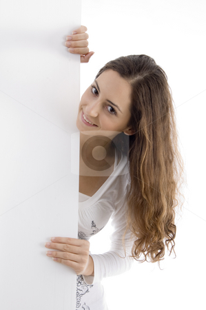 To use this stock image in your creative project, please select the size you need over to the right and click the "Add to Cart" button.
Your downloaded image will come with the Cutcaster watermark removed so don’t worry about the watermark you see on this page. Young caucasian woman peeping over placard stock photo, Young caucasian woman peeping over placard against white background by Imagery Majestic