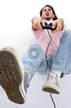 To use this stock image in your creative project, please select the size you need over to the right and click the "Add to Cart" button.
Your downloaded image will come with the Cutcaster watermark removed so don’t worry about the watermark you see on this page. Laying angry man holding remote stock photo, Laying angry man holding remote against white background by Imagery Majestic