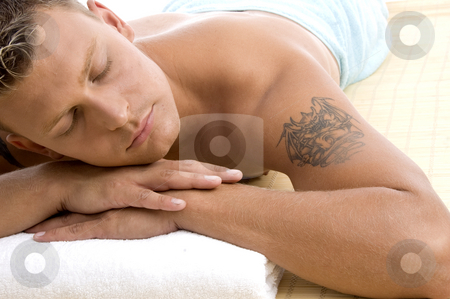 To use this stock image in your creative project, please select the size you need over to the right and click the "Add to Cart" button.
Your downloaded image will come with the Cutcaster watermark removed so don’t worry about the watermark you see on this page. Handsome male lying in spa resort stock photo, Handsome male lying in spa resort against white background by Imagery Majestic