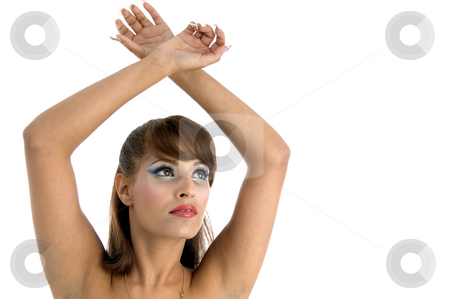 To use this stock image in your creative project, please select the size you need over to the right and click the "Add to Cart" button.
Your downloaded image will come with the Cutcaster watermark removed so don’t worry about the watermark you see on this page. Female with raised arms stock photo, Female with raised arms on an isolated background by Imagery Majestic