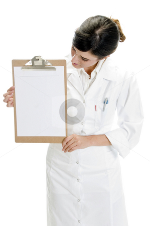 To use this stock image in your creative project, please select the size you need over to the right and click the "Add to Cart" button.
Your downloaded image will come with the Cutcaster watermark removed so don’t worry about the watermark you see on this page. Lady doctor looking paper in writing board stock photo, Lady doctor looking paper in writing board with white background by Imagery Majestic