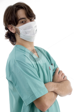 To use this stock image in your creative project, please select the size you need over to the right and click the "Add to Cart" button.
Your downloaded image will come with the Cutcaster watermark removed so don’t worry about the watermark you see on this page. Doctor in scrubs and facemask stock photo, Doctor in scrubs and facemask isolated on white background by Imagery Majestic
