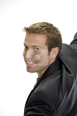 To use this stock image in your creative project, please select the size you need over to the right and click the "Add to Cart" button.
Your downloaded image will come with the Cutcaster watermark removed so don’t worry about the watermark you see on this page. Portrait of young male model stock photo, Portrait of young male model looking back at camera by Imagery Majestic
