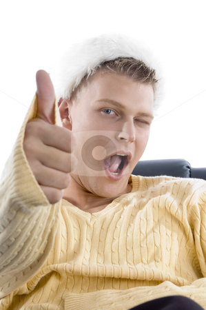 To use this stock image in your creative project, please select the size you need over to the right and click the "Add to Cart" button.
Your downloaded image will come with the Cutcaster watermark removed so don’t worry about the watermark you see on this page. Man showing thumbs up stock photo, Man showing thumbs up on an isolated background by Imagery Majestic