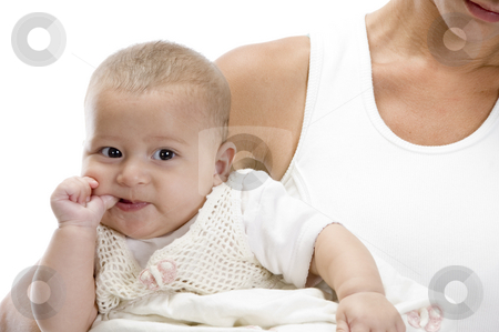 To use this stock image in your creative project, please select the size you need over to the right and click the "Add to Cart" button.
Your downloaded image will come with the Cutcaster watermark removed so don’t worry about the watermark you see on this page. Mother holding little baby stock photo, Mother holding little baby and naughty baby sucking his thumb by Imagery Majestic