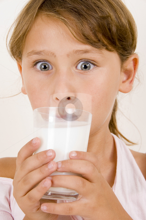 To use this stock image in your creative project, please select the size you need over to the right and click the "Add to Cart" button.
Your downloaded image will come with the Cutcaster watermark removed so don’t worry about the watermark you see on this page. Cute little girl drinking milk stock photo, Cute little girl drinking milk by Imagery Majestic