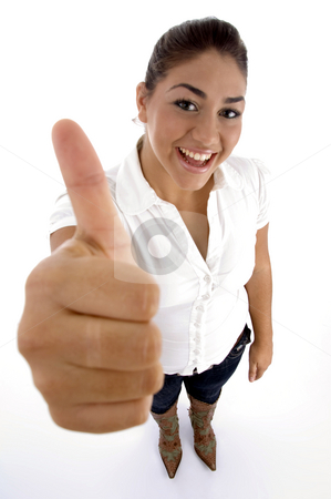To use this stock image in your creative project, please select the size you need over to the right and click the "Add to Cart" button.
Your downloaded image will come with the Cutcaster watermark removed so don’t worry about the watermark you see on this page. Standing woman wishing you good luck stock photo, Standing woman wishing you good luck on an isolated white background by Imagery Majestic