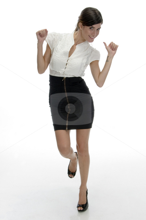 To use this stock image in your creative project, please select the size you need over to the right and click the "Add to Cart" button.
Your downloaded image will come with the Cutcaster watermark removed so don’t worry about the watermark you see on this page. Dancing beautiful model stock photo, Dancing beautiful model on an isolated white background by Imagery Majestic