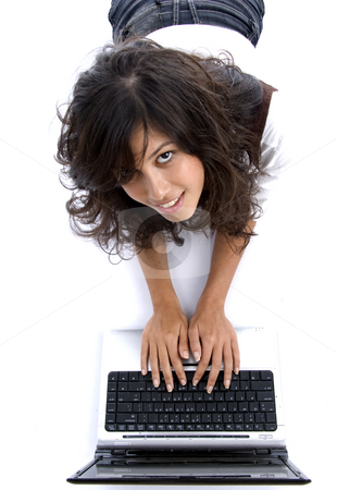 To use this stock image in your creative project, please select the size you need over to the right and click the "Add to Cart" button.
Your downloaded image will come with the Cutcaster watermark removed so don’t worry about the watermark you see on this page. Young female lying on floor working on laptop stock photo, Young female lying on floor working on laptop against white background by Imagery Majestic