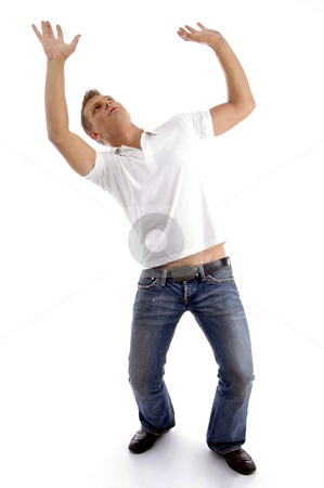 To use this stock image in your creative project, please select the size you need over to the right and click the "Add to Cart" button.
Your downloaded image will come with the Cutcaster watermark removed so don’t worry about the watermark you see on this page. Man looking upwards and posing like holding something stock photo, Man looking upwards and posing like holding something with white background by Imagery Majestic