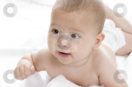 To use this stock image in your creative project, please select the size you need over to the right and click the "Add to Cart" button.
Your downloaded image will come with the Cutcaster watermark removed so don’t worry about the watermark you see on this page. Cute newborn baby boy lying stock photo, Cute newborn baby boy lying with facial expressions by Imagery Majestic