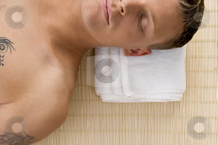 To use this stock image in your creative project, please select the size you need over to the right and click the "Add to Cart" button.
Your downloaded image will come with the Cutcaster watermark removed so don’t worry about the watermark you see on this page. Man relaxing with his eyes closed at spa stock photo, Man relaxing with his eyes closed at spa against white background by Imagery Majestic