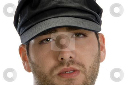 To use this stock image in your creative project, please select the size you need over to the right and click the "Add to Cart" button.
Your downloaded image will come with the Cutcaster watermark removed so don’t worry about the watermark you see on this page. Grumpy Young Man with hat stock photo, Grumpy Young Man with hat on an isolated white background by Imagery Majestic