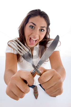 To use this stock image in your creative project, please select the size you need over to the right and click the "Add to Cart" button.
Your downloaded image will come with the Cutcaster watermark removed so don’t worry about the watermark you see on this page. Cute teenager showing cutlery stock photo, Cute teenager showing cutlery on an isolated white background by Imagery Majestic