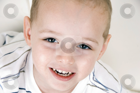 To use this stock image in your creative project, please select the size you need over to the right and click the "Add to Cart" button.
Your downloaded image will come with the Cutcaster watermark removed so don’t worry about the watermark you see on this page. Cute smiling boy stock photo, Cute smiling boy looking at camera by Imagery Majestic