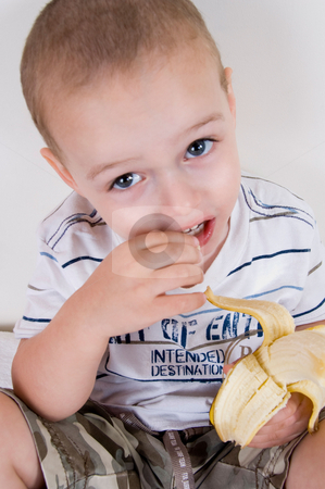 To use this stock image in your creative project, please select the size you need over to the right and click the "Add to Cart" button.
Your downloaded image will come with the Cutcaster watermark removed so don’t worry about the watermark you see on this page. Cute boy holding peeled banana stock photo, Close up of cute boy holding peeled banana by Imagery Majestic