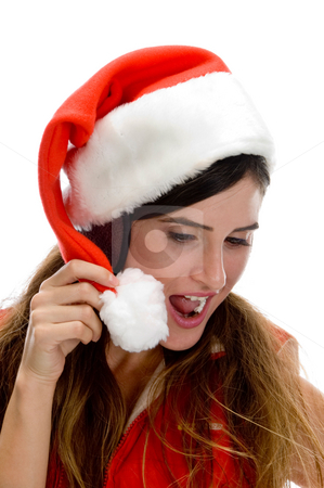 To use this stock image in your creative project, please select the size you need over to the right and click the "Add to Cart" button.
Your downloaded image will come with the Cutcaster watermark removed so don’t worry about the watermark you see on this page. Woman with santa cap and looking downward stock photo, Woman with santa cap and looking downward on an isolated white background by Imagery Majestic