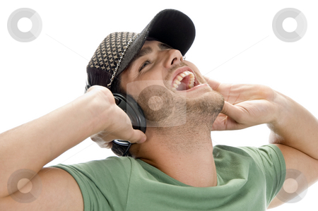 To use this stock image in your creative project, please select the size you need over to the right and click the "Add to Cart" button.
Your downloaded image will come with the Cutcaster watermark removed so don’t worry about the watermark you see on this page. Happy man enjoying music stock photo, Happy man enjoying music on an isolated white background by Imagery Majestic