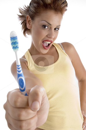 To use this stock image in your creative project, please select the size you need over to the right and click the "Add to Cart" button.
Your downloaded image will come with the Cutcaster watermark removed so don’t worry about the watermark you see on this page. Woman with tooth brush stock photo, Woman with tooth brush on an isolated white background by Imagery Majestic