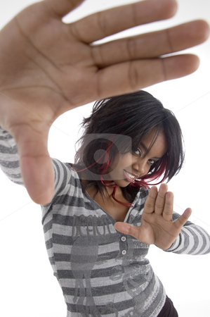 To use this stock image in your creative project, please select the size you need over to the right and click the "Add to Cart" button.
Your downloaded image will come with the Cutcaster watermark removed so don’t worry about the watermark you see on this page. Girl showing her hands stock photo, Girl showing her hands against white background by Imagery Majestic