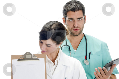To use this stock image in your creative project, please select the size you need over to the right and click the "Add to Cart" button.
Your downloaded image will come with the Cutcaster watermark removed so don’t worry about the watermark you see on this page. Medical professionals with paper in writing board stock photo, Medical professionals with paper in writing board against white background by Imagery Majestic