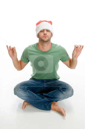 To use this stock image in your creative project, please select the size you need over to the right and click the "Add to Cart" button.
Your downloaded image will come with the Cutcaster watermark removed so don’t worry about the watermark you see on this page. Man doing meditation stock photo, Man doing meditation on an isolated background by Imagery Majestic