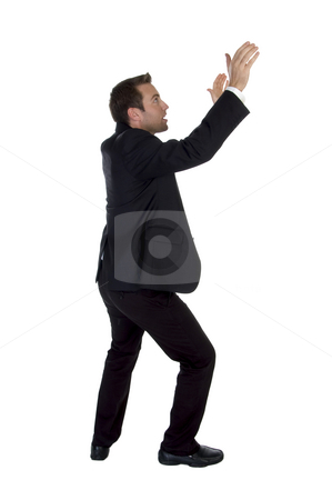 To use this stock image in your creative project, please select the size you need over to the right and click the "Add to Cart" button.
Your downloaded image will come with the Cutcaster watermark removed so don’t worry about the watermark you see on this page. Side view of success businessman with raised hands stock photo, Side view of success businessman with raised hands on white background by Imagery Majestic