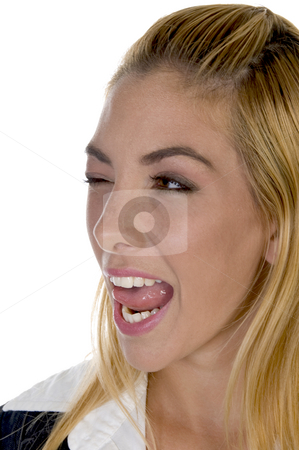 To use this stock image in your creative project, please select the size you need over to the right and click the "Add to Cart" button.
Your downloaded image will come with the Cutcaster watermark removed so don’t worry about the watermark you see on this page. Female licking her lips with winked eye stock photo, Female licking her lips with winked eyes on an isolated white background by Imagery Majestic
