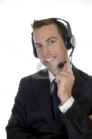 To use this stock image in your creative project, please select the size you need over to the right and click the "Add to Cart" button.
Your downloaded image will come with the Cutcaster watermark removed so don’t worry about the watermark you see on this page. Young man calling with headset and smiling stock photo, Young man calling with headset and smiling on white background by Imagery Majestic