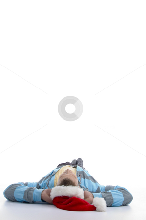 To use this stock image in your creative project, please select the size you need over to the right and click the "Add to Cart" button.
Your downloaded image will come with the Cutcaster watermark removed so don’t worry about the watermark you see on this page. Laying man with christmas hat stock photo, Laying man with christmas hat against white background by Imagery Majestic