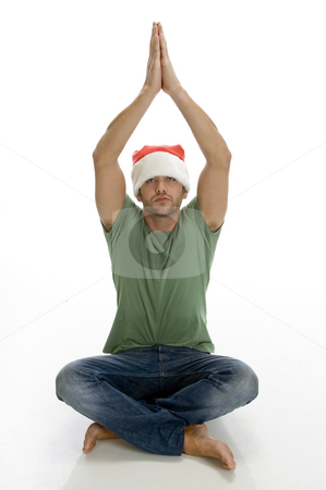 To use this stock image in your creative project, please select the size you need over to the right and click the "Add to Cart" button.
Your downloaded image will come with the Cutcaster watermark removed so don’t worry about the watermark you see on this page. Praying man with santa cap stock photo, Praying man with santa cap with white background by Imagery Majestic