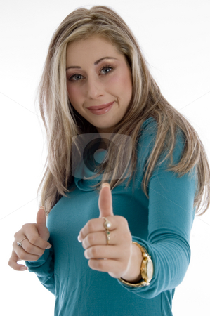 To use this stock image in your creative project, please select the size you need over to the right and click the "Add to Cart" button.
Your downloaded image will come with the Cutcaster watermark removed so don’t worry about the watermark you see on this page. Smiling woman showing good luck sign stock photo, Smiling woman showing good luck sign on an isolated background by Imagery Majestic