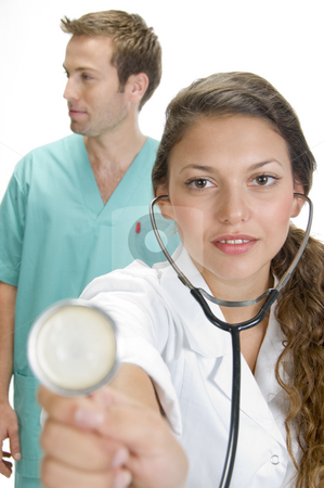 To use this stock image in your creative project, please select the size you need over to the right and click the "Add to Cart" button.
Your downloaded image will come with the Cutcaster watermark removed so don’t worry about the watermark you see on this page. Close up of smiling lady doctor with stethoscope and male doctor stock photo, Close up of smiling lady doctor with stethoscope and male doctor by Imagery Majestic