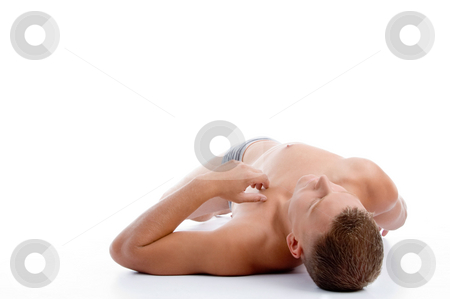 To use this stock image in your creative project, please select the size you need over to the right and click the "Add to Cart" button.
Your downloaded image will come with the Cutcaster watermark removed so don’t worry about the watermark you see on this page. Laying muscular man stock photo, Laying muscular man with white background by Imagery Majestic