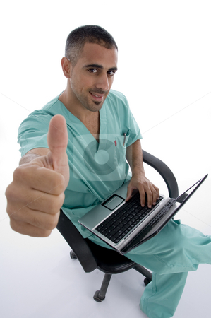 To use this stock image in your creative project, please select the size you need over to the right and click the "Add to Cart" button.
Your downloaded image will come with the Cutcaster watermark removed so don’t worry about the watermark you see on this page. American doctor with notebook stock photo, American doctor with notebook against white background by Imagery Majestic