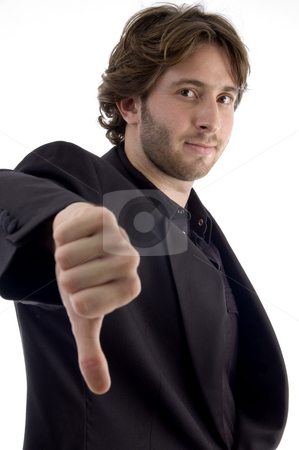 To use this stock image in your creative project, please select the size you need over to the right and click the "Add to Cart" button.
Your downloaded image will come with the Cutcaster watermark removed so don’t worry about the watermark you see on this page. Man showing disapproval sign stock photo, Man showing disapproval sign with white background by Imagery Majestic