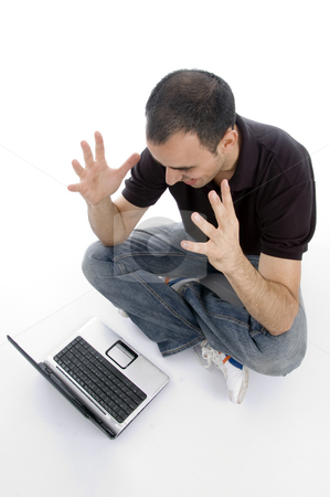 To use this stock image in your creative project, please select the size you need over to the right and click the "Add to Cart" button.
Your downloaded image will come with the Cutcaster watermark removed so don’t worry about the watermark you see on this page. Pleased man looking to laptop stock photo, Pleased man looking to laptop on an isolated background by Imagery Majestic