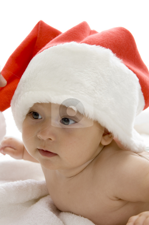 To use this stock image in your creative project, please select the size you need over to the right and click the "Add to Cart" button.
Your downloaded image will come with the Cutcaster watermark removed so don’t worry about the watermark you see on this page. Cute young baby wearing santa cap stock photo, Cute young baby wearing santa cap against white background by Imagery Majestic
