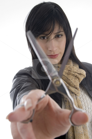 To use this stock image in your creative project, please select the size you need over to the right and click the "Add to Cart" button.
Your downloaded image will come with the Cutcaster watermark removed so don’t worry about the watermark you see on this page. Female barber holding scissors stock photo, Female barber holding scissors on an isolated white background by Imagery Majestic