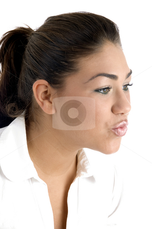To use this stock image in your creative project, please select the size you need over to the right and click the "Add to Cart" button.
Your downloaded image will come with the Cutcaster watermark removed so don’t worry about the watermark you see on this page. Woman making kissing gesture stock photo, Woman making kissing gesture with white background by Imagery Majestic