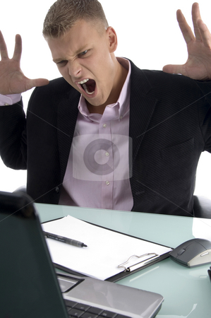 To use this stock image in your creative project, please select the size you need over to the right and click the "Add to Cart" button.
Your downloaded image will come with the Cutcaster watermark removed so don’t worry about the watermark you see on this page. Frustrated young manager stock photo, Frustrated young manager with white background by Imagery Majestic