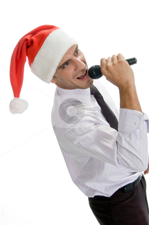 To use this stock image in your creative project, please select the size you need over to the right and click the "Add to Cart" button.
Your downloaded image will come with the Cutcaster watermark removed so don’t worry about the watermark you see on this page. Male singing into karaoke stock photo, Male singing into karaoke on an isolated background by Imagery Majestic