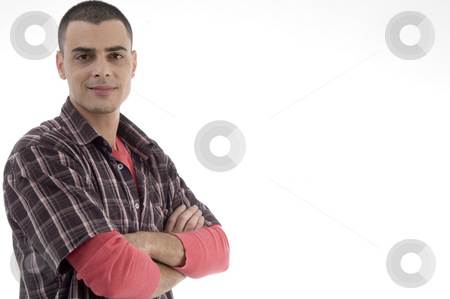 To use this stock image in your creative project, please select the size you need over to the right and click the "Add to Cart" button.
Your downloaded image will come with the Cutcaster watermark removed so don’t worry about the watermark you see on this page. Young man with crossed arms stock photo, Young man with crossed arms on an isolated white background by Imagery Majestic